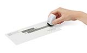 The Guard Your ID Mini-Roller is a compact stamp that easily and permanently covers your sensitive information on junk mail, invoices, credit card statements and more.